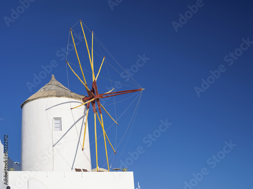 lonely old mill in sky on Santorini