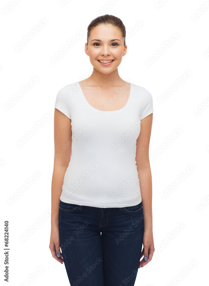 Fototapeta premium smiling young woman in blank white t-shirt