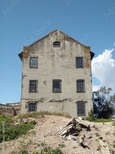 Rundown Quartermaster building on Alcatraz Island photo