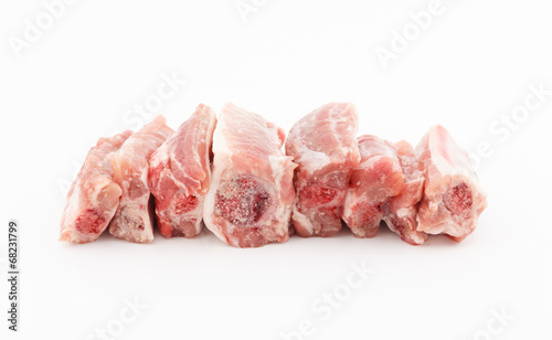 Raw pork ribs on white background