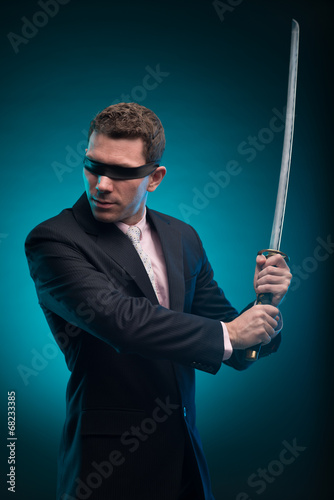 Businessman with katana sword