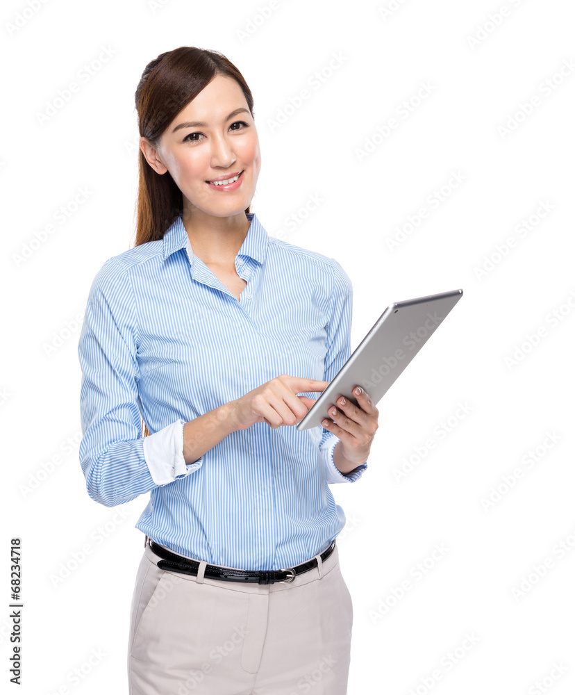 Asian businesswoman use tablet on white background Asian businesswoman use tablet on white background
