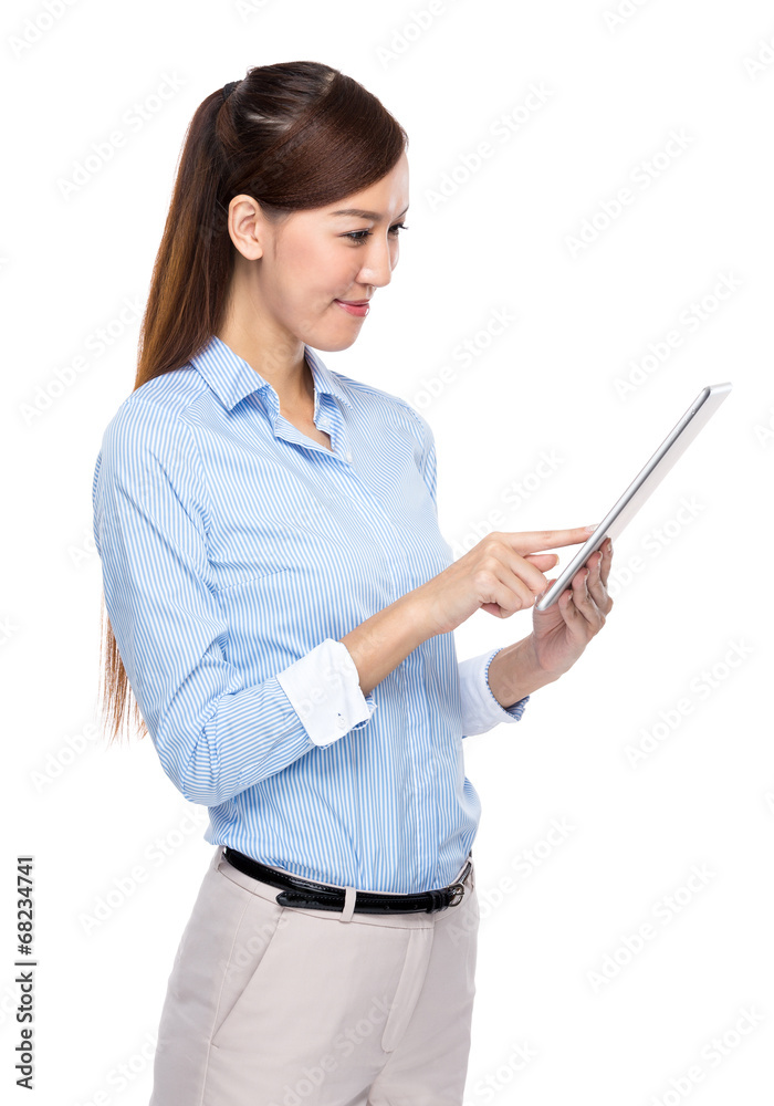 Asian businesswoman use tablet on white background Asian businesswoman use tablet on white background