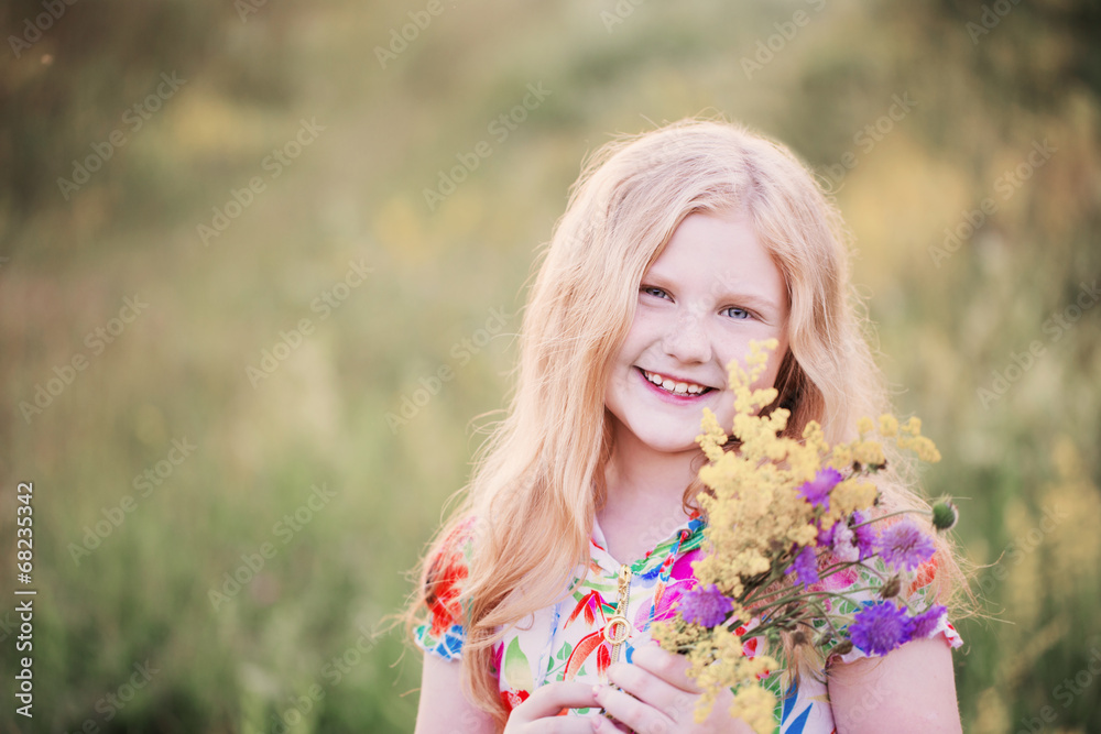 happy gir with flowersl on meadow happy gir with flowersl on meadow
