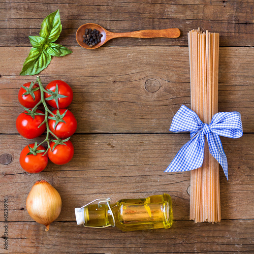 Ingridients for pasta with tomato sauce photo