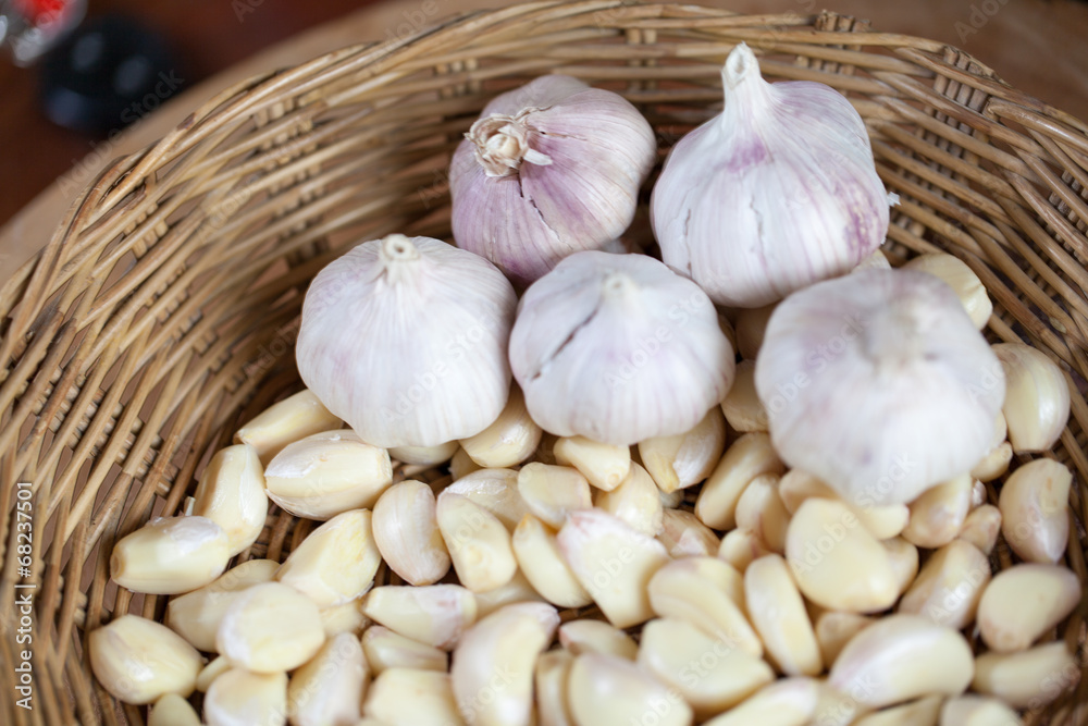 Organic garlic in a straw basket