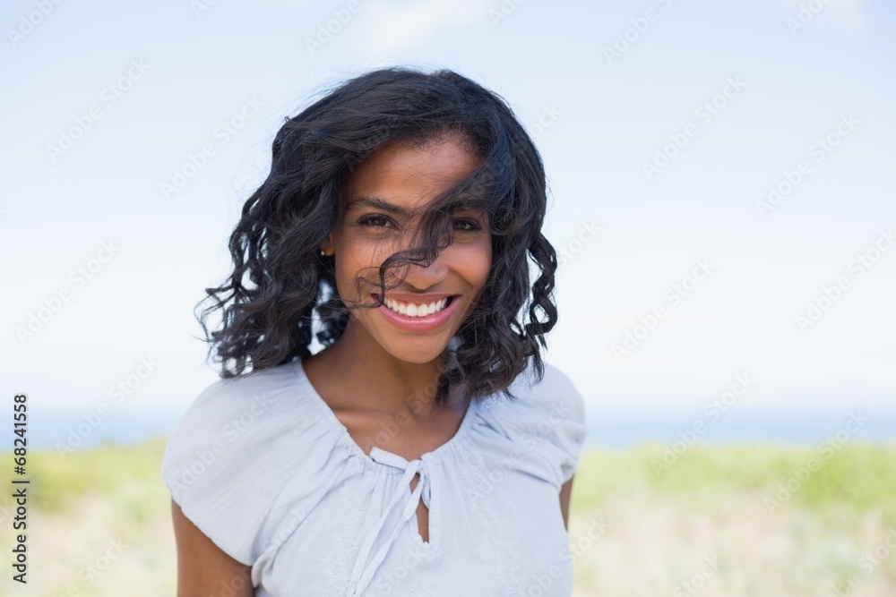 Casual pretty woman smiling at camera