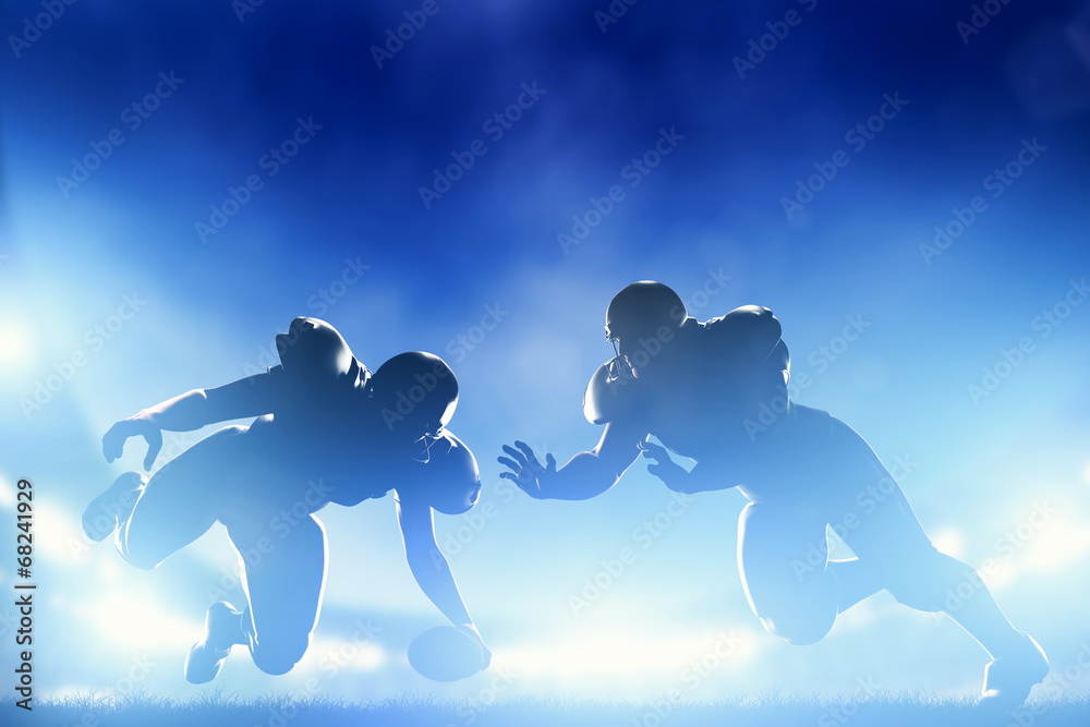 American football players in game, touchdown. Stadium lights