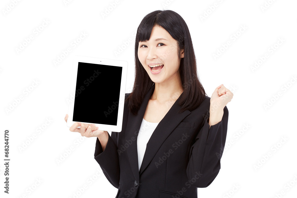 タブレットを持ってガッツポーズするビジネスウーマン タブレットを持ってガッツポーズするビジネスウーマン