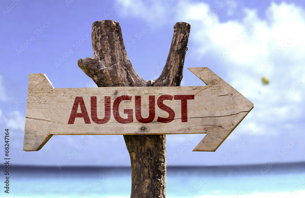 August wooden sign on a beautiful day