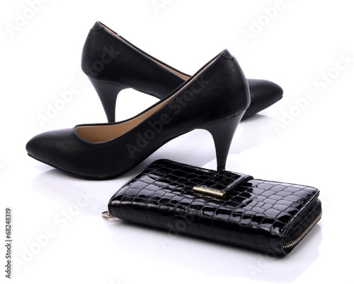 Women's shoes and a black w...