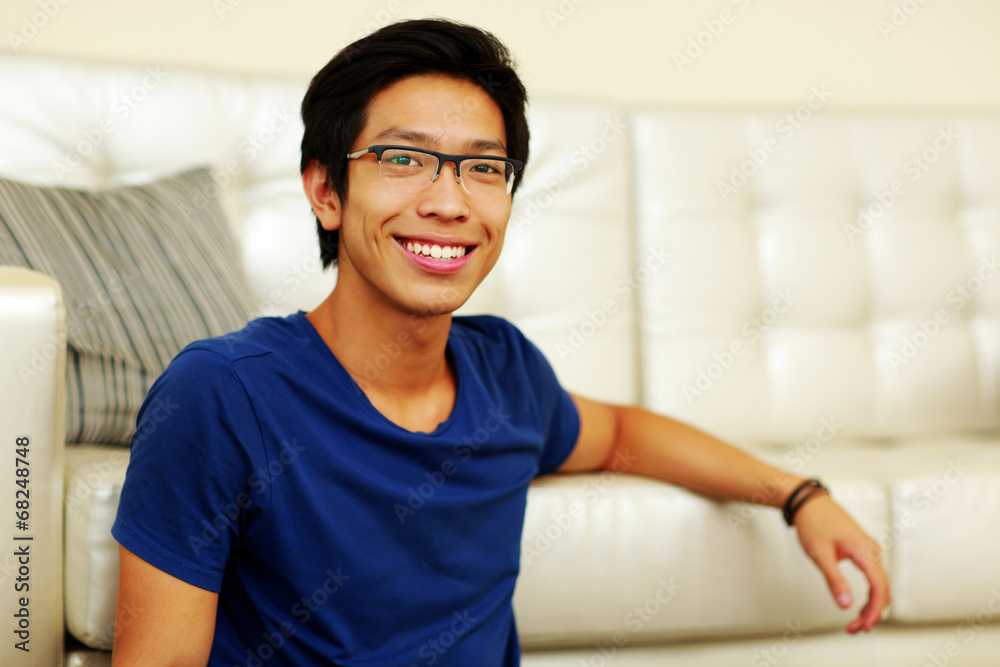 Portrait of a smiling young asian man at home Portrait of a smiling young asian man at home