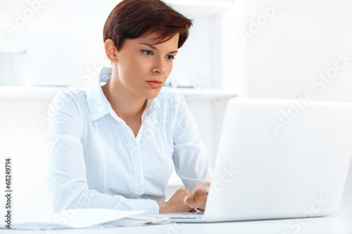 Business Woman with Laptop Working in Office Free Download Business Woman with Laptop Working in Office - GFXLoad