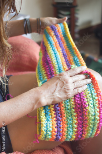 a girl with an handmade scarf