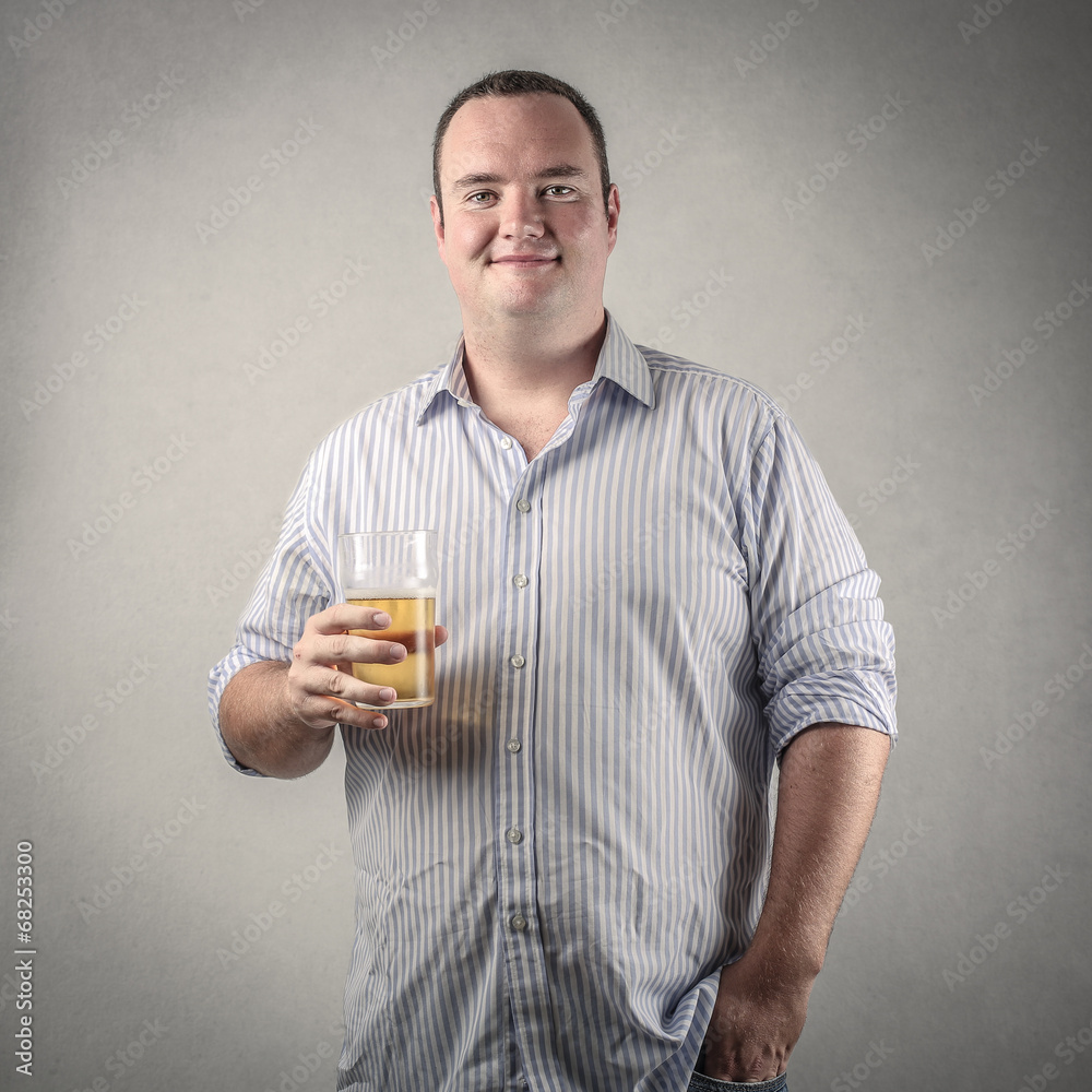 man with a glass of beer