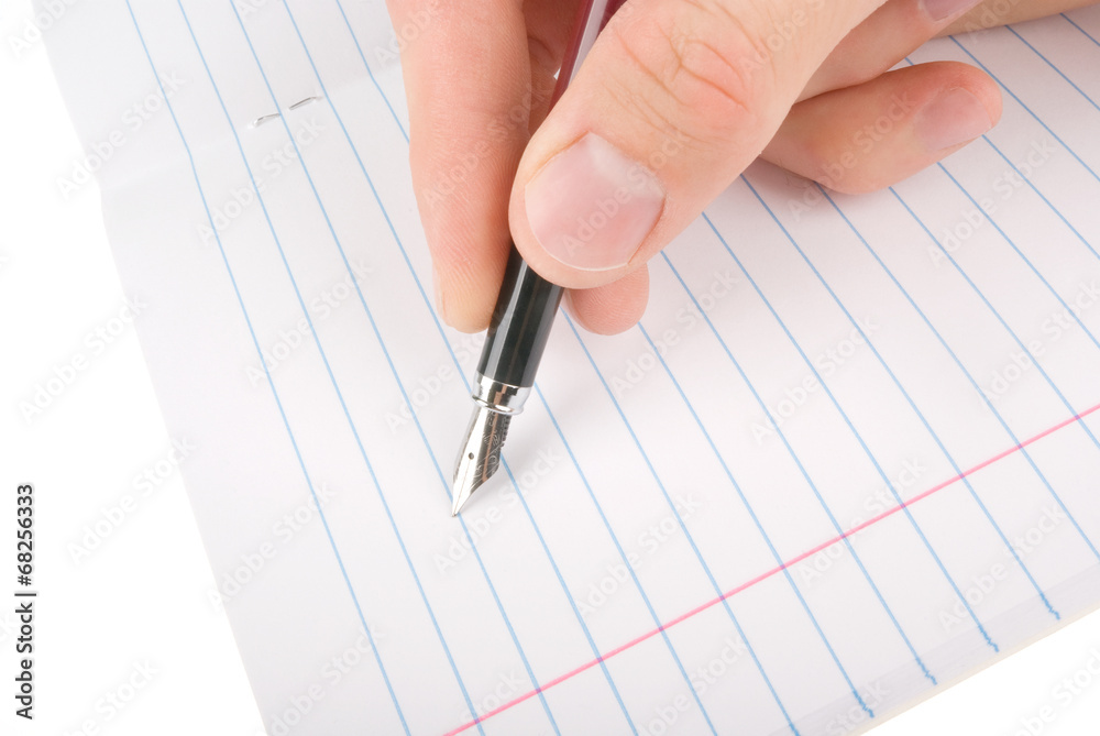 Hand writing on empty notepad (notebook) isolated on white Hand writing on empty notepad (notebook) isolated on white