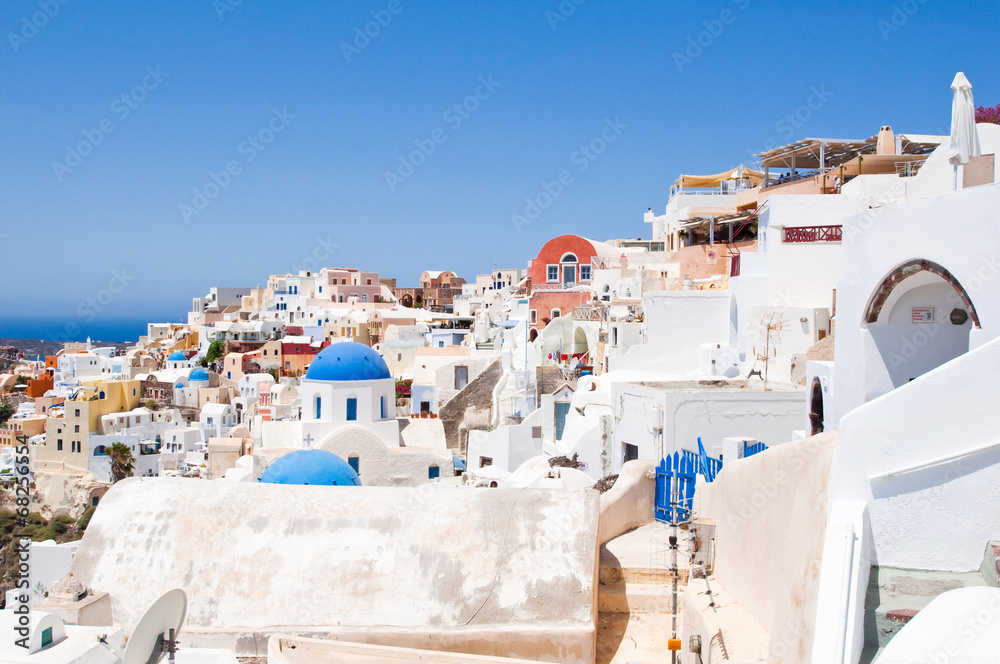 View of Oia with typical houses on the island of Santorini.