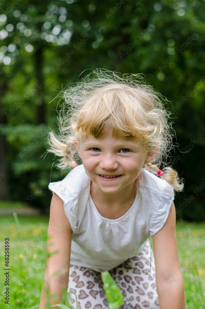blond girl on grass blond girl on grass