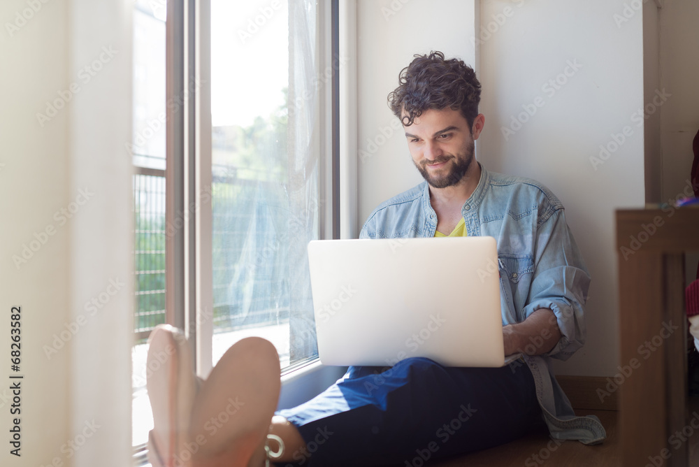 handsome hipster modern man working home using laptop handsome hipster modern man working home using laptop