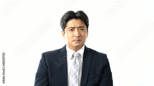 禁止の意思表示をするビジネスマン