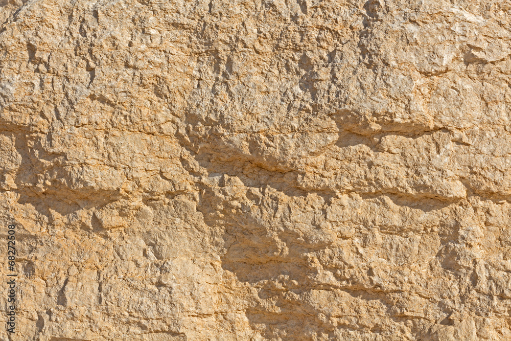 Obraz premium Texture - light yellow sandstone, structure of stone.