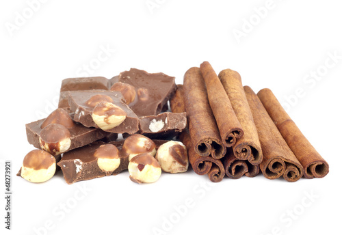 Chocolate with hazelnuts and cinnamon isolated