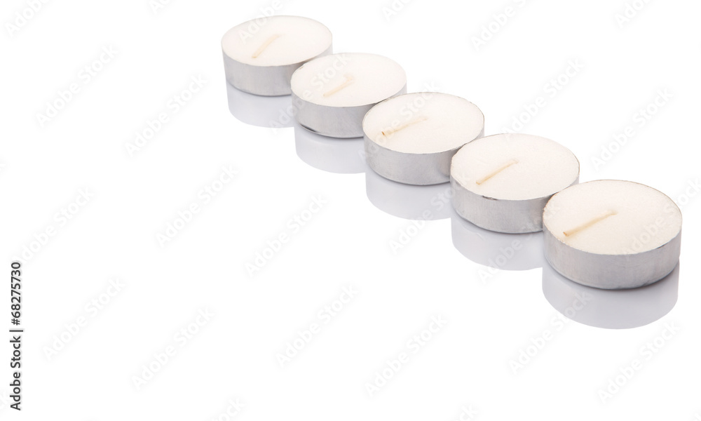 Small tealights over white background Small tealights over white background
