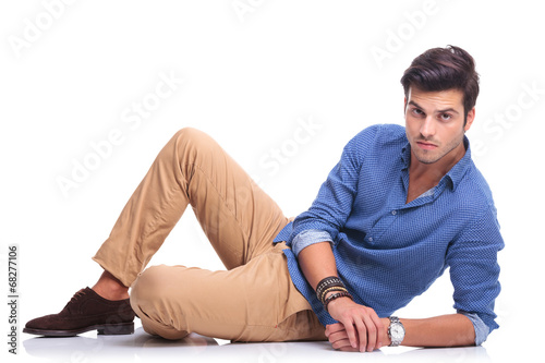 relaxed casual fashion man lying down