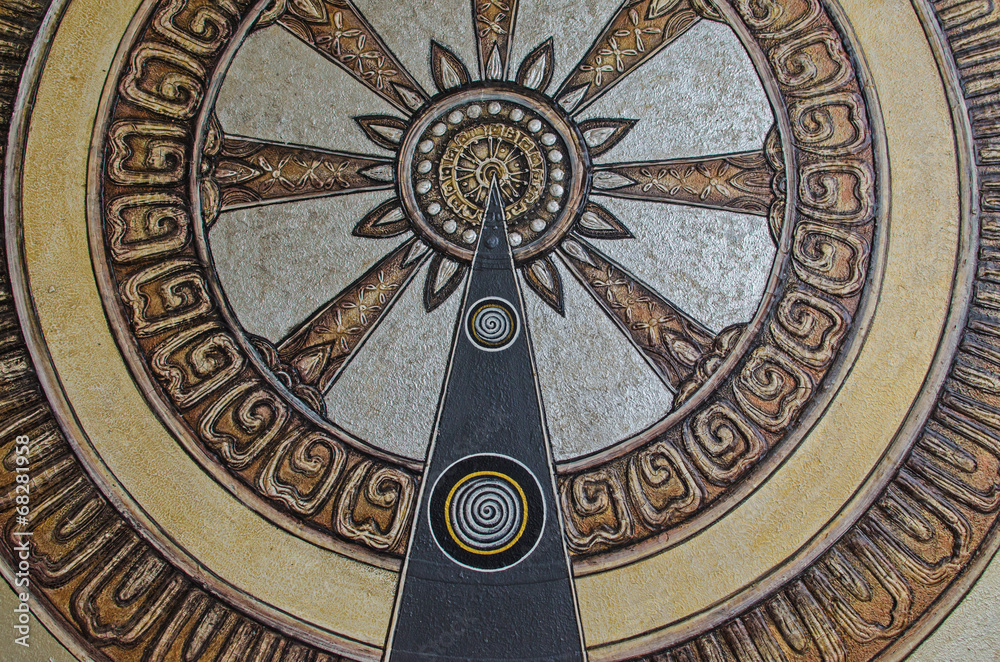 Circular wheel decorated wall art texture background
