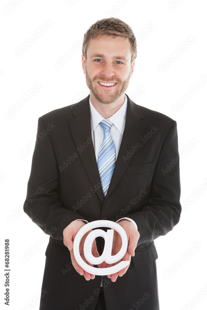 Happy Young Businessman Holding Internet Icon Happy Young Businessman Holding Internet Icon