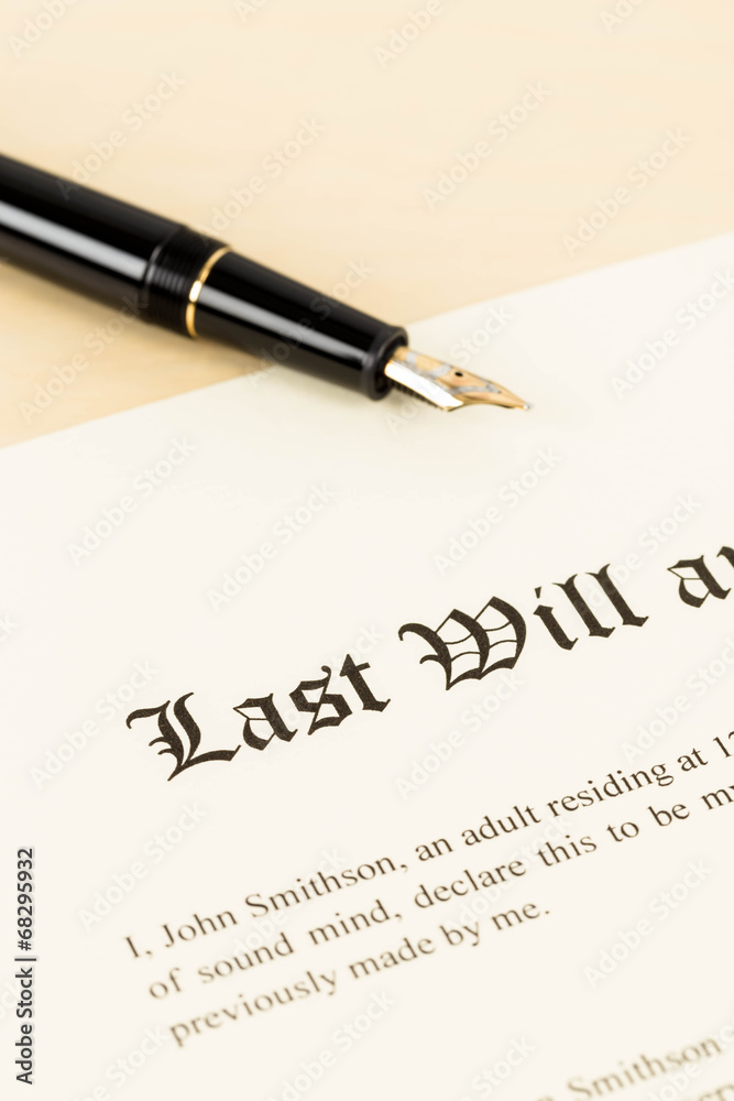 Last will on cream color paper and pen concept for legal documen Last will on cream color paper and pen concept for legal documen