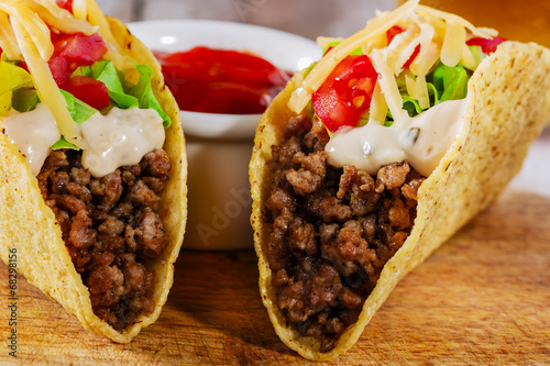 tacos with minced meat with greens and tomatoes