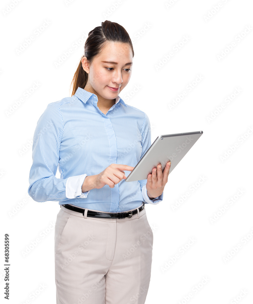Business secretary read on digital tablet Business secretary read on digital tablet