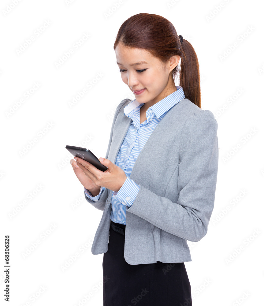 Young businesswoman look at cellphone Young businesswoman look at cellphone