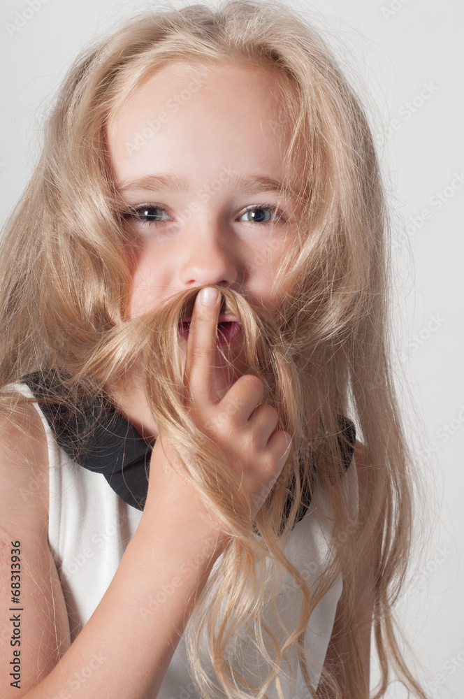 Little girl with long hair fooling around Little girl with long hair fooling around