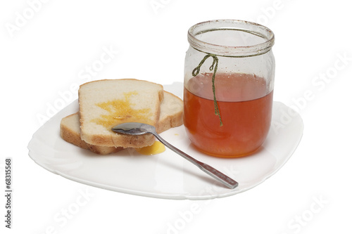 breakfast with two toast and fresh honey
