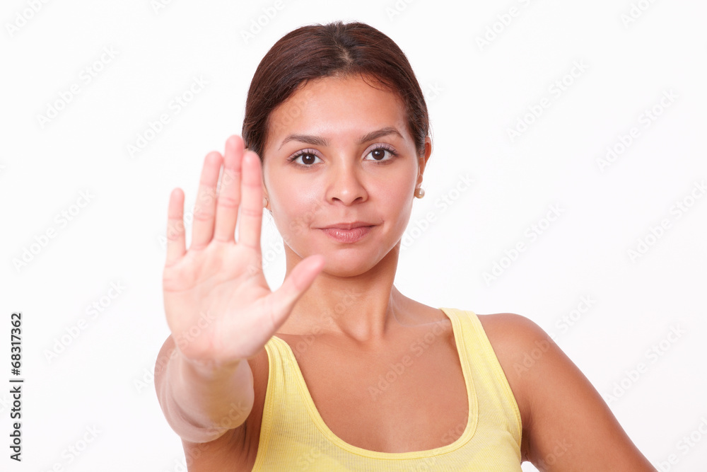 Young hispanic lady with stop gesture Young hispanic lady with stop gesture