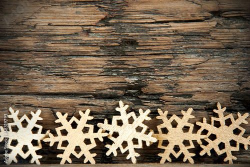 Golden Snowflakes on Wood photo