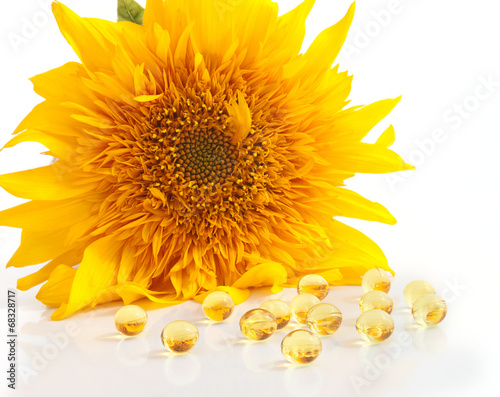 Sunflower and Capsules with vitamins A and E