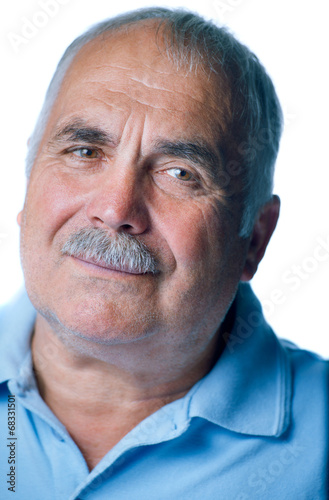 Lonely old man with gray hair and mustache