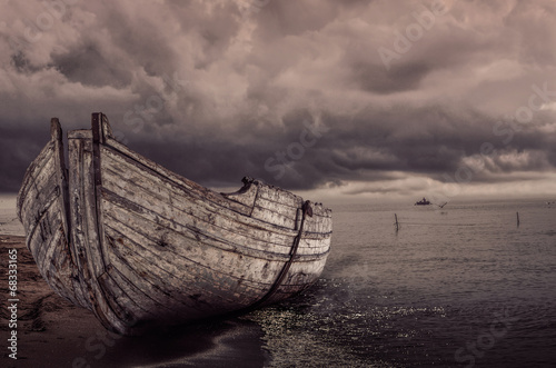 Fototapeta Naklejka Na Ścianę i Meble -  Alone Boat