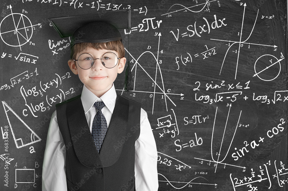 boy near blackboard with formulas boy near blackboard with formulas