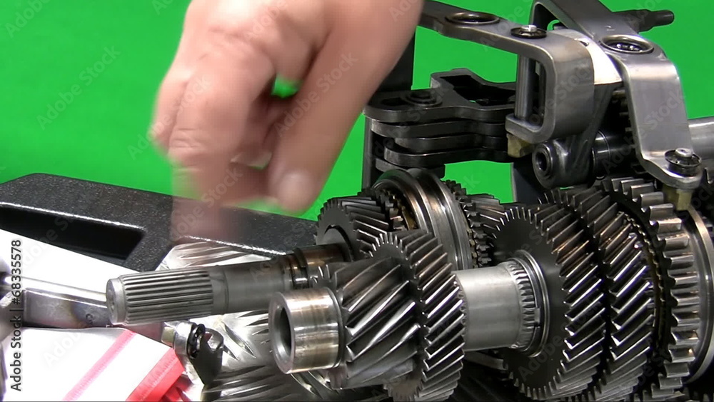 Dismantling car gearbox 4. Teacher showing parts