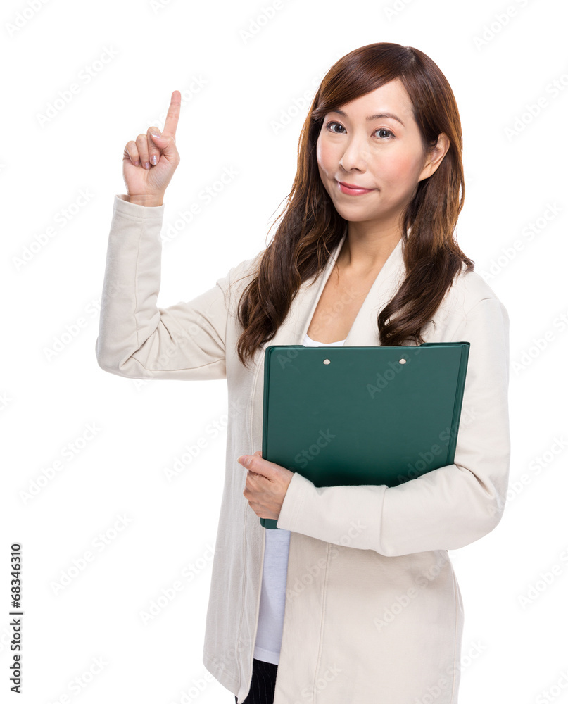 Middle age woman with clipboard and finger up Middle age woman with clipboard and finger up