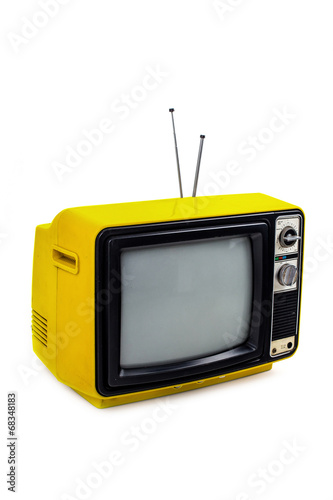 Yellow vintage style old television isolated on white