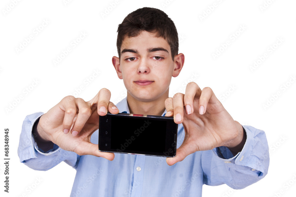 Young boy with phone becoming a self-portrait Young boy with phone becoming a self-portrait
