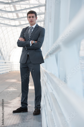 Businessman standing arms crossed