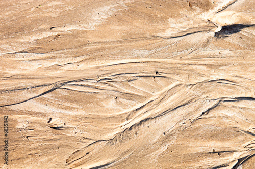 Sand surface with the relief formed by water currents