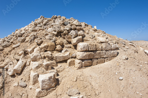 Old roman ruins on desert coastline