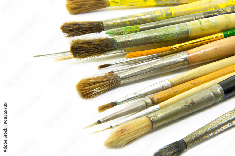 Fototapeta premium Paint brushes on white bcakground